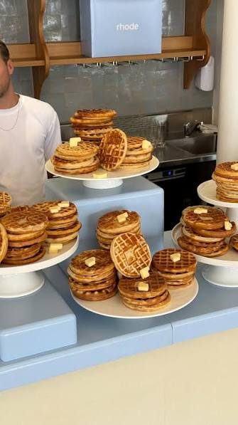 Stacks of waffles on cake stands at the Rhode bakery takeover